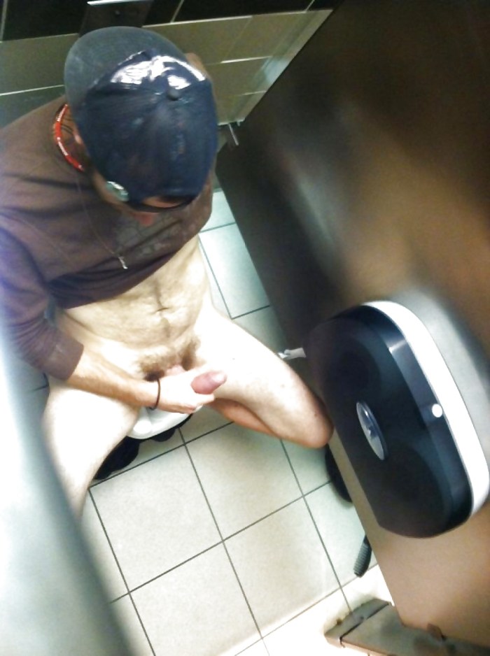 Naked men in a public toilet