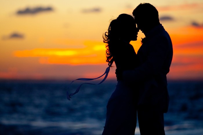 The silhouette of men and women