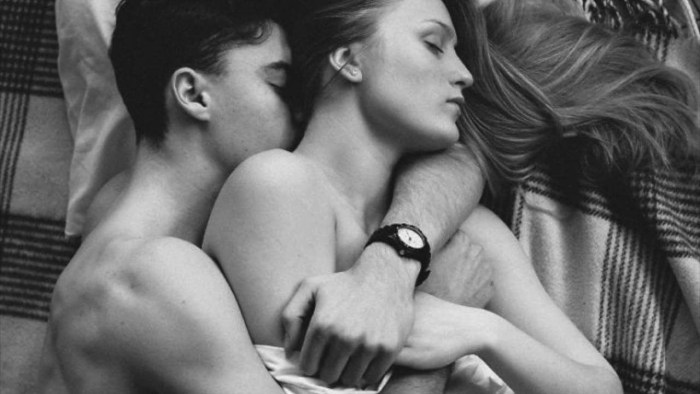 Guy and girl in bed