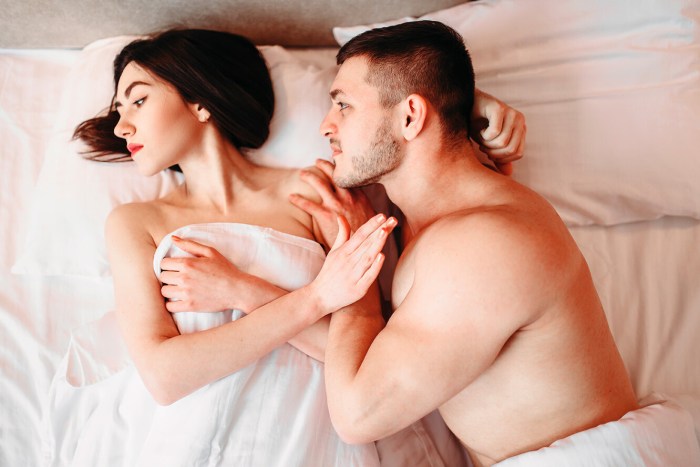 A woman is a bed