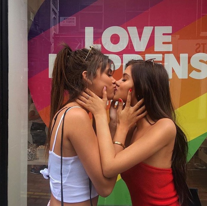 Young girls kiss