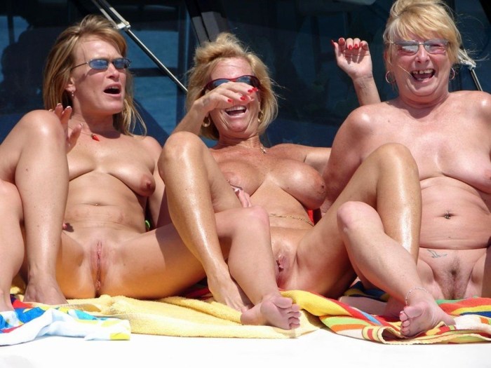 Naked girls among people