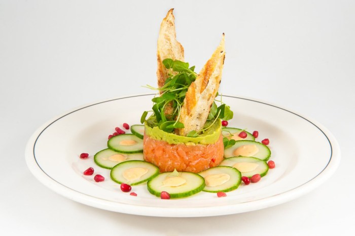 Tartar from salmon feed in a restaurant