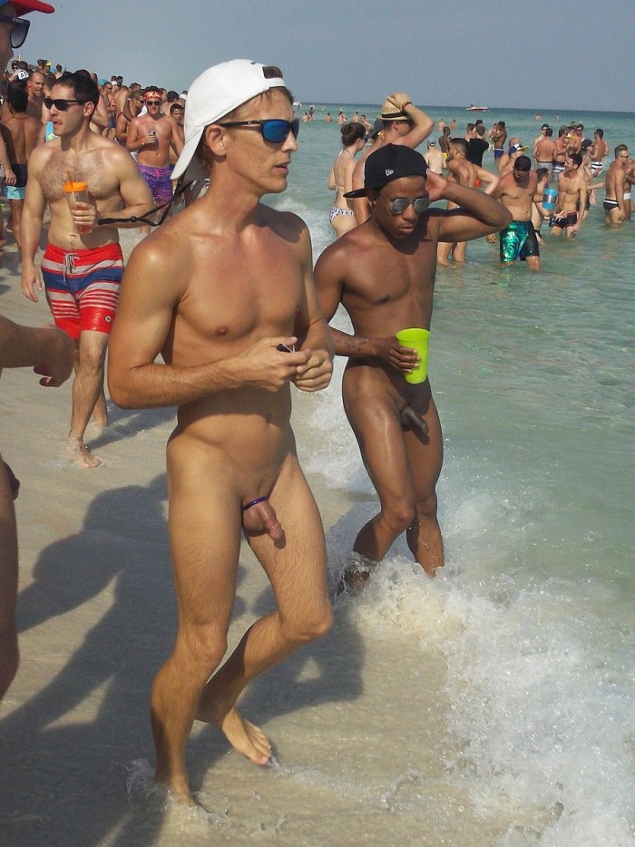 Sports naked guy on the beach