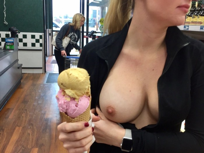 Girls expose breasts in a cafe