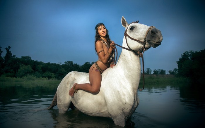 Jennifer Lopez riding a horse