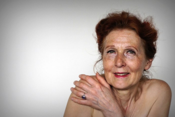 Old face of a woman nude