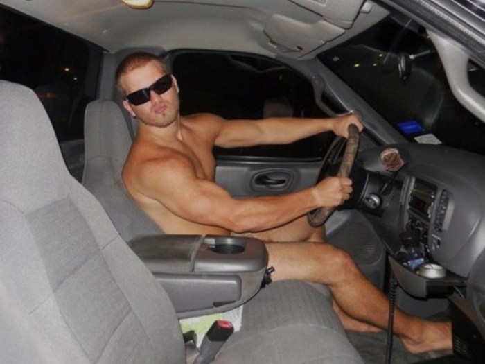 Naked men in a car