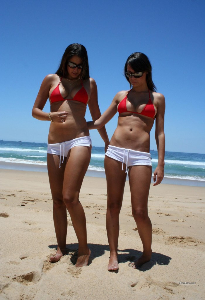 Young girls in thongs on the beach