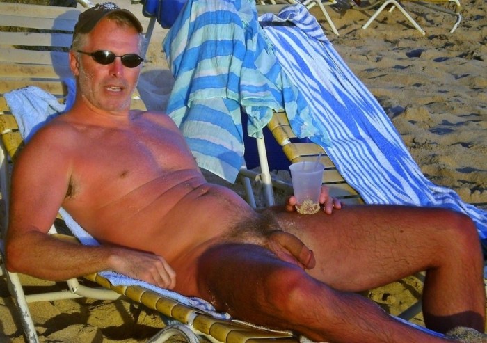 Naked mature men at sea