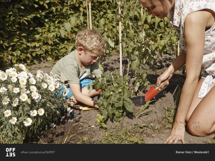 A woman with a child in the garden