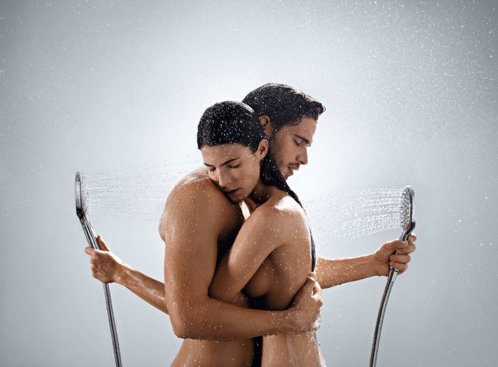Naked legs of a man in a bath