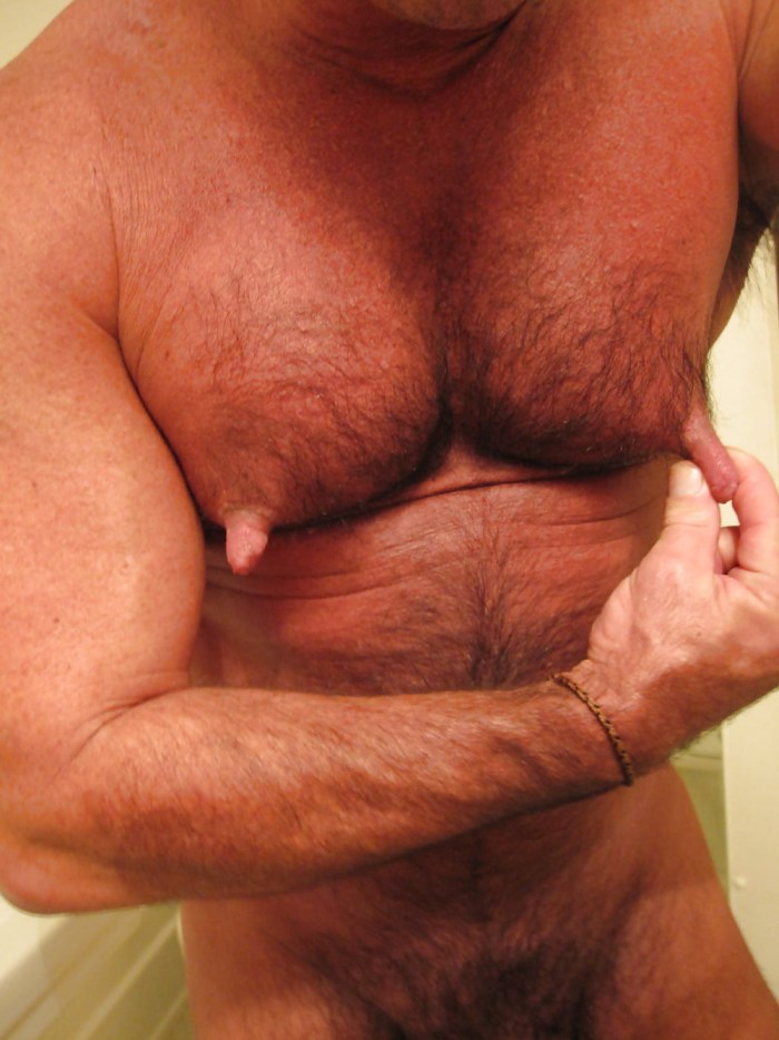 Man licks a woman's boobs