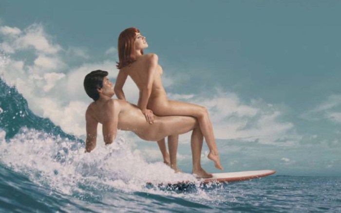 A woman has a man strapon