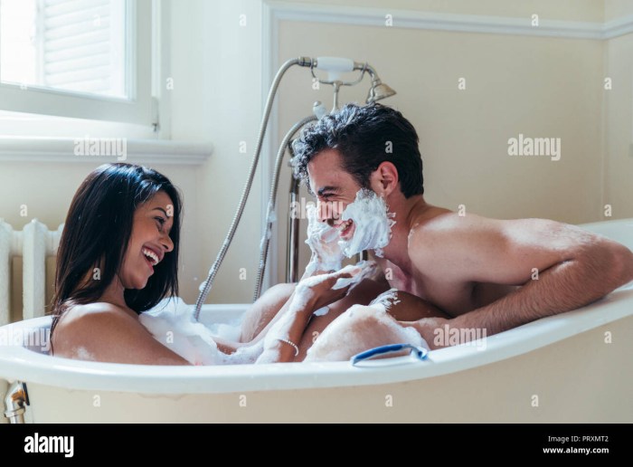 Woman with a boy in the bathroom