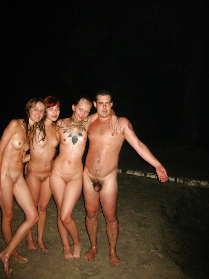 Naked men and women in nature