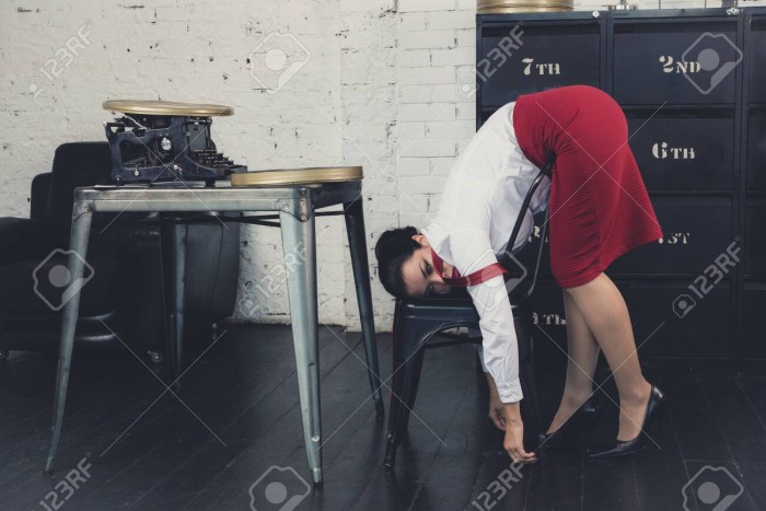 Woman strangles a man photo