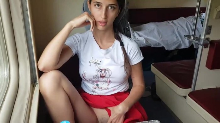 Girl in shorts on the train