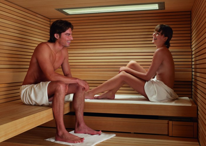 Naked girls with guys in a bathhouse