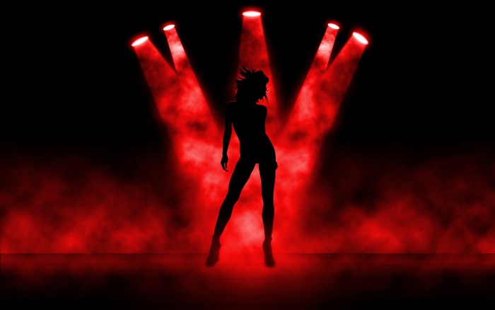 Girl dances in the dark