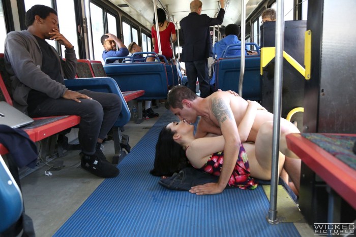 The girl sucked on the bus