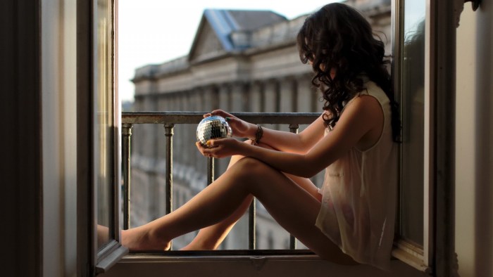 A woman on the windowsill