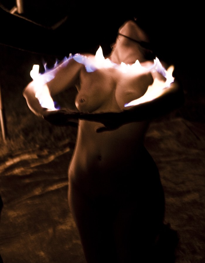 The girl undressed on barbecue