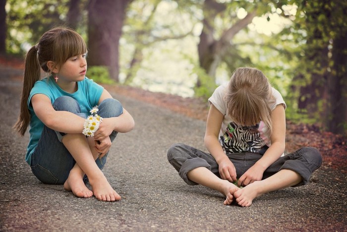 Children barefoot in the amusement park