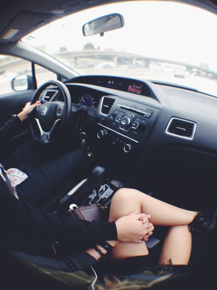 The girl is driving
