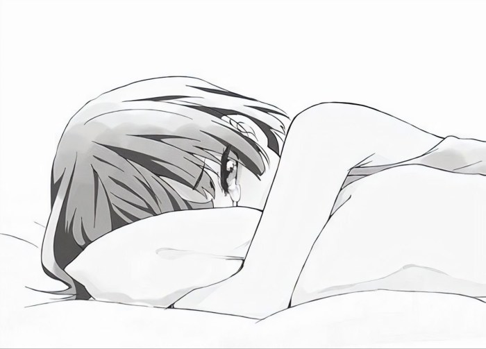 Anime cries in a pillow