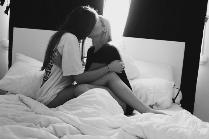 Several girls in bed