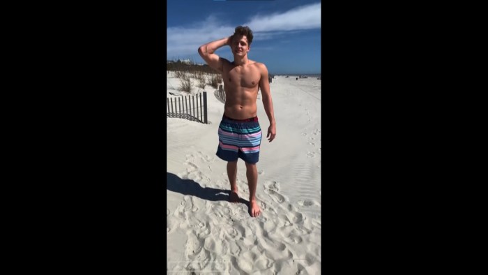 Male masturbation on the beach