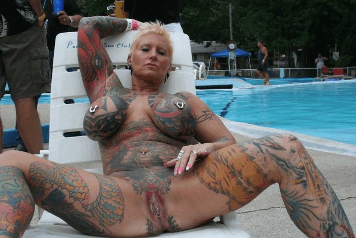 Masturbation with tattoo on the leg