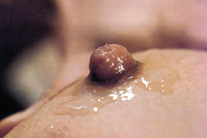 Big elastic boobs with milk