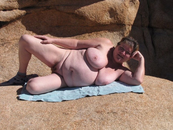 Naked tanned old woman