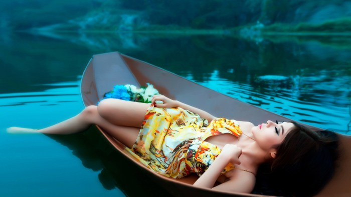 Beautiful girl in a boat