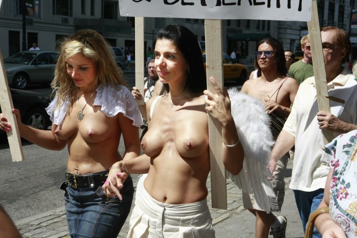 Woman topless in the city