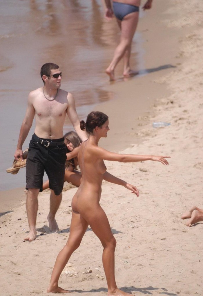 Naked in the shower on the beach Spain