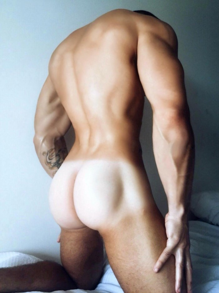 Naked guys with hanging eggs view from behind Flexible naked guys