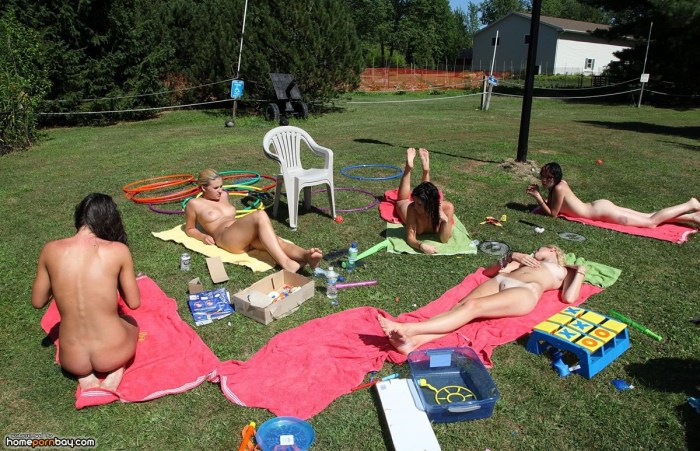 Naked women in the country with vegetables