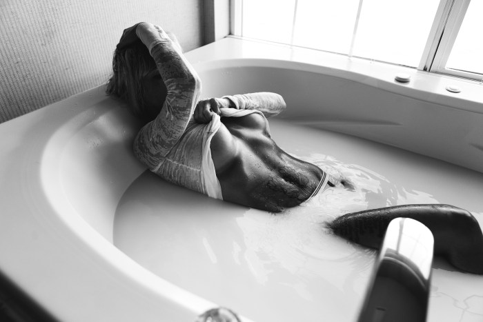 Girl lies in the bathroom