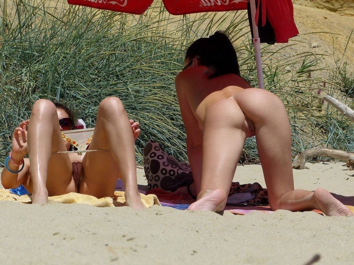 Naked pussy on a public beach