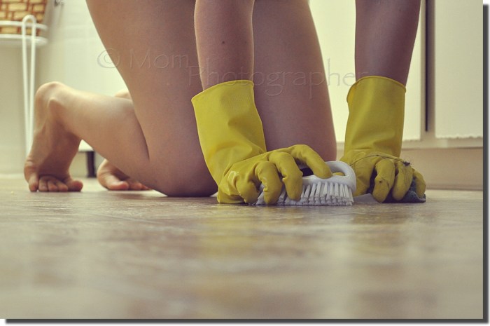 A naked blonde is cleaned