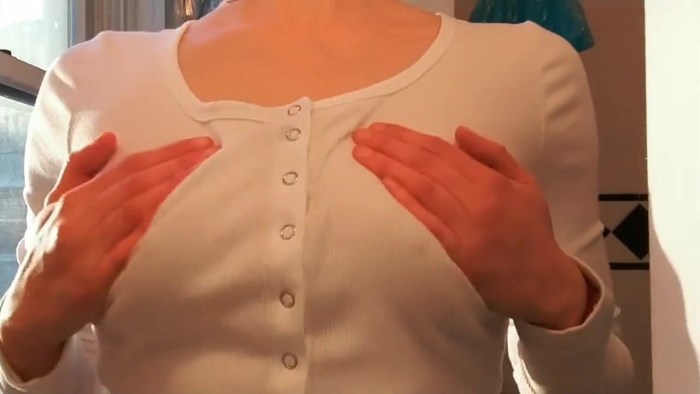 Girl in a T -shirt without a bra