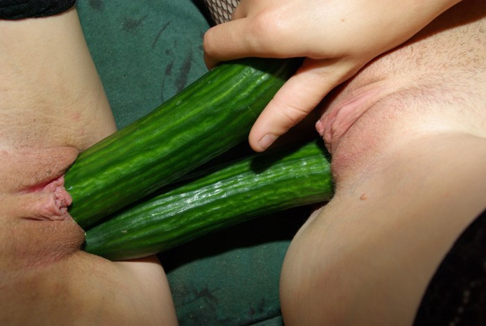Girl with cucumber in vagina
