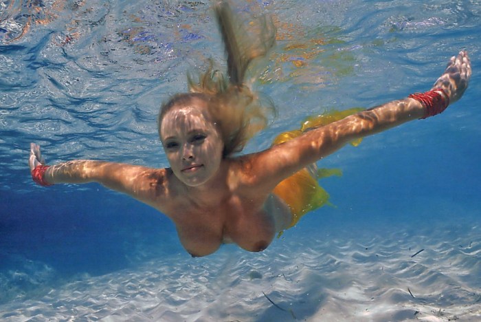 Naked girls bathing in the river