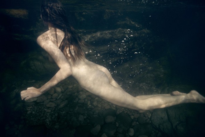 Naked girls in transparent water