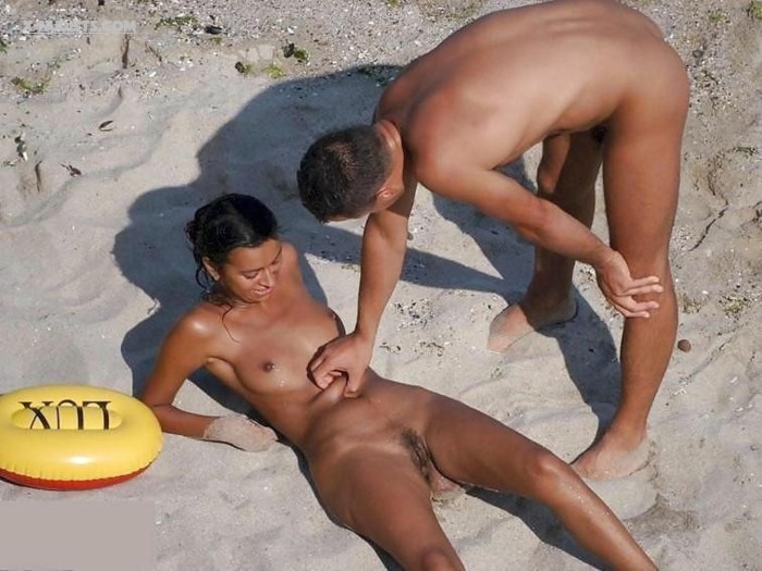 Men and women without panties on the beach