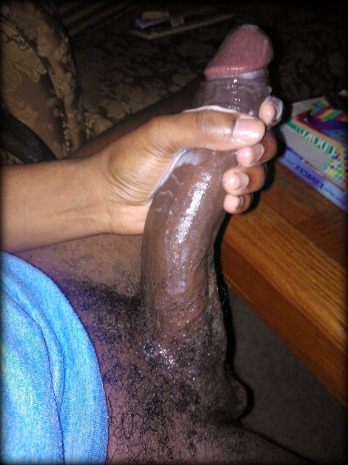 Huge black members in a condom