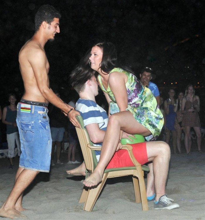 Beautiful gangbang on the beach